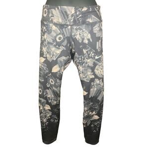 Nike Dri Fit Leggings Blue With Pink Flower Print
Size Small